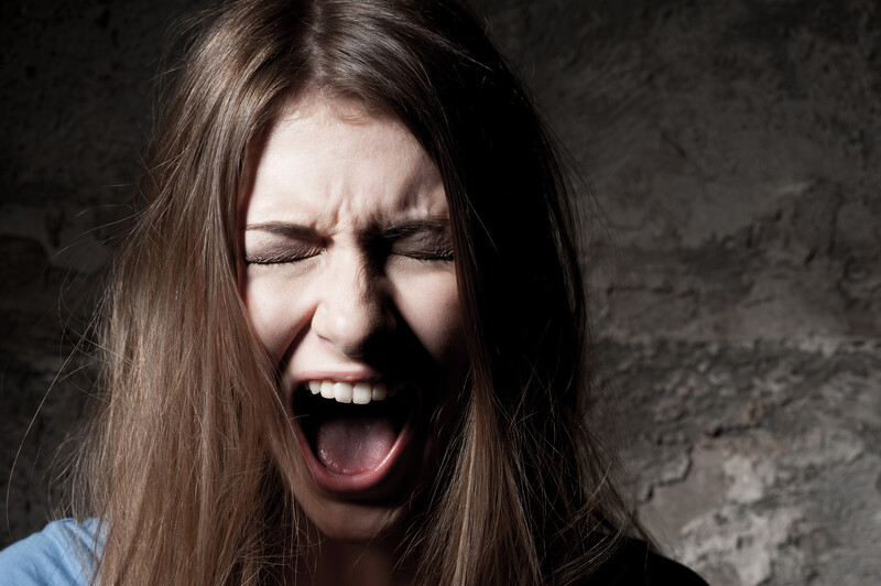 victim of narcissistic abuse: Black and white image of woman screaming in fear