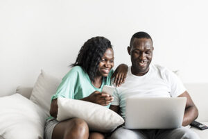 Dating during divorce: A couple smiling and laughing together