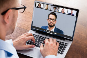 Practicing Family Law During a Pandemic: lawyer on zoom call with colleagues