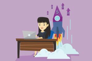 woman working on laptop with rocket taking off behind her: 5 steps to establish a family law firm