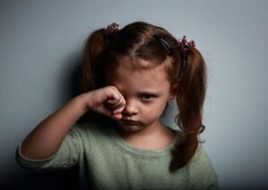 child sexual abuse: little girl crying